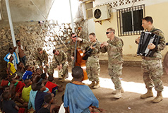 Band of MId-America performing during a deployment